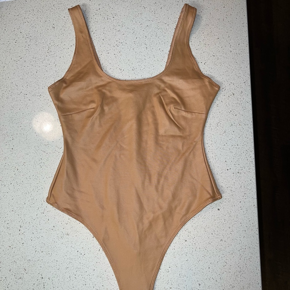 SKIMS WET JERSEY BODYSUIT OCHRE